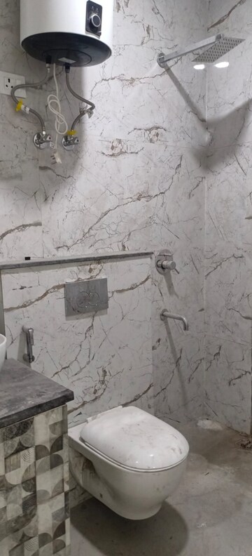 Bathroom in 3 BHK Builder Floor at Freedom Fighters Enclave – for Rent