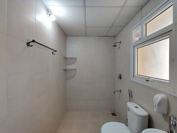 Bathroom in 2 BHK Apartment at Bhartiya City Nikoo Homes II, Thanisandra Main Road – for Rent