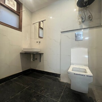 Bathroom in 2 BHK Builder Floor at Chattarpur – for Rent