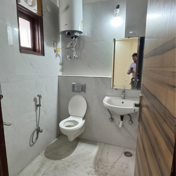 Bathroom in 2 BHK Builder Floor at Palm Residency Chhatarpur, Rajpur Khurd Extension – for Rent