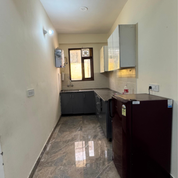 Kitchen in 2 BHK Builder Floor at Palm Residency Chhatarpur, Rajpur Khurd Extension – for Rent
