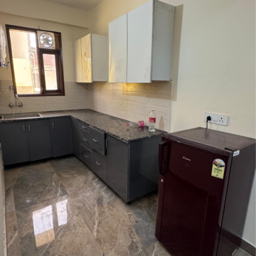 Kitchen in 2 BHK Builder Floor at Palm Residency Chhatarpur, Rajpur Khurd Extension – for Rent