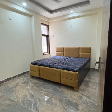 Bedroom in 2 BHK Builder Floor at Palm Residency Chhatarpur, Rajpur Khurd Extension – for Rent