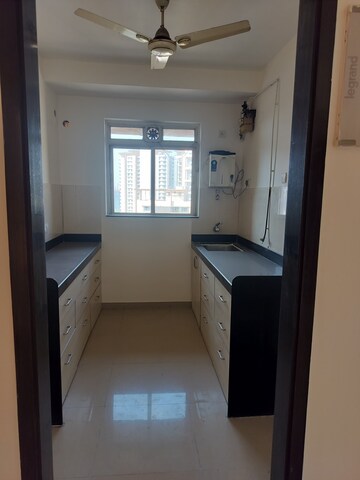 Kitchen in 2 BHK Apartment at Rustomjee Athena, Majiwada – for Rent