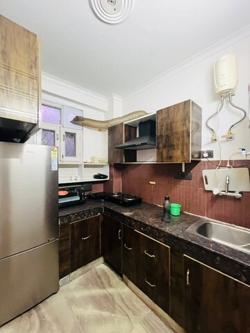 Kitchen in 1 BHK Apartment at Freedom Fighters Enclave – for Rent