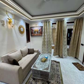 Living Room in 2 BHK Builder Floor at Palm Residency Chhatarpur, Rajpur Khurd Extension – for Rent