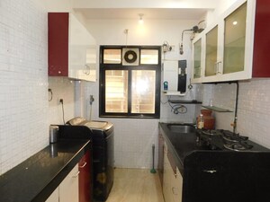 Kitchen in 2 BHK Apartment at Anuradha Anuja CHS, Borivali West – for Sale