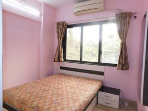 Bedroom in 2 BHK Apartment at Anuradha Anuja CHS, Borivali West – for Sale