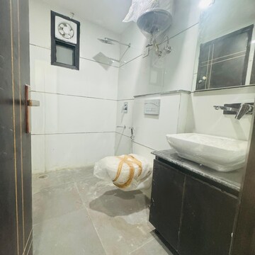 Bathroom in 3 BHK Builder Floor at Risland Sky Mansion, Chattarpur – for Rent