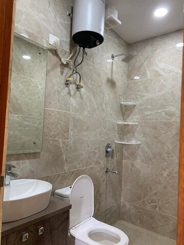 Bathroom in 1 BHK Builder Floor at Ansal Sushant Lok I, Sector 43 – for Rent