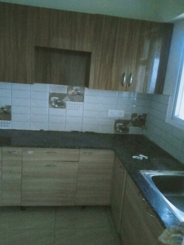 Kitchen in 2 BHK Apartment at Gaur Atulyam, Omicron I Greater Noida – for Rent