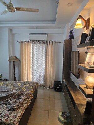 Living Room in 2 BHK Apartment at Paramount Floraville, Sector 137 – for Sale