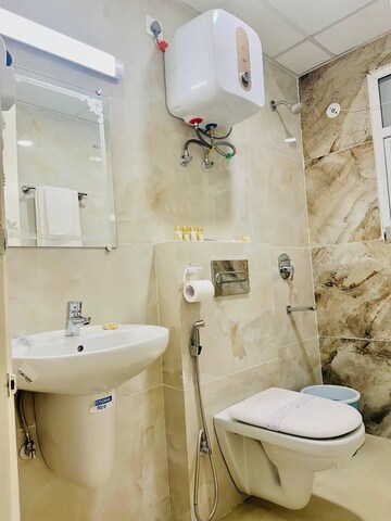 Bathroom in 3 BHK Apartment at Omaxe The Palace, Gomti Nagar – for Rent