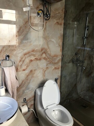 Bathroom in 3 BHK Builder Floor at Ansal API Esencia, Sector 67 – for Rent