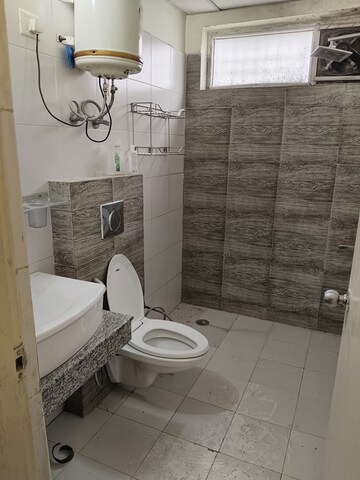 Bathroom in 3 BHK Apartment at Orchid Island, Sector 51 – for Rent