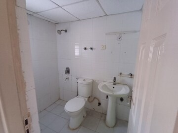 Bathroom in 2 BHK Apartment at Shri Radha Sky Gardens, Sector 16b Greater Noida – for Sale