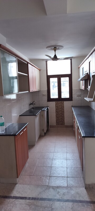 Kitchen in 4 BHK Apartment at Amrapali Exotica, Sector 50 – for Rent