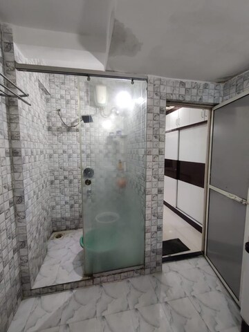 Bathroom in 1 BHK Apartment at Sanjay Kakade Township, Chinchwad – for Rent