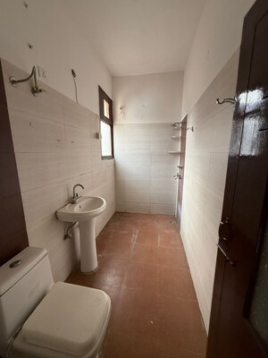 Bathroom in 3 BHK Apartment at Dhakoli – for Sale