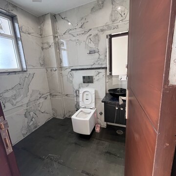 Bathroom in 3 BHK Builder Floor at DLF Galleria Market, Sector 27 – for Rent