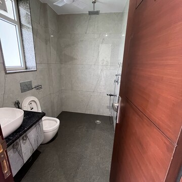 Bathroom in 3 BHK Builder Floor at DLF Galleria Market, Sector 27 – for Rent