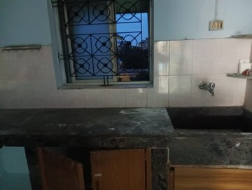 Kitchen in 3 BHK Apartment at Saheed Nagar – for Sale