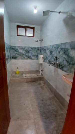 Bathroom in 4 BHK Apartment at Jasola Vihar – for Sale