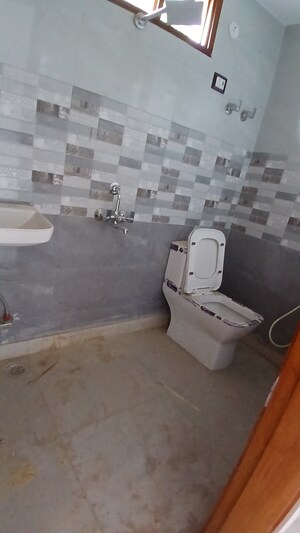 Bathroom in 4 BHK Apartment at Jasola Vihar – for Sale