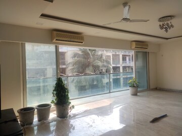 Living Room in 4 BHK Apartment at White Lotus, Santacruz West – for Rent