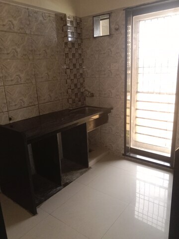 Kitchen in 1 BHK Apartment at Ritu Gardenia, Naigaon East – for Rent
