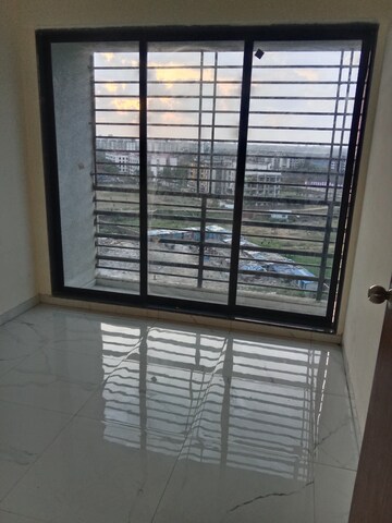 Room in 2 BHK Apartment at Navkar City Phase II, Naigaon East – for Rent