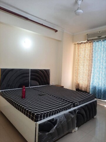 Bedroom in 3.5 BHK Apartment at Aims Golf City, Sector 75 – for Rent