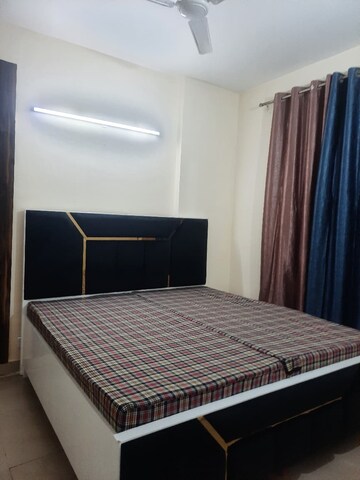 Bedroom in 3.5 BHK Apartment at Aims Golf City, Sector 75 – for Rent