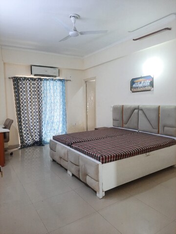 Bedroom in 3.5 BHK Apartment at Aims Golf City, Sector 75 – for Rent