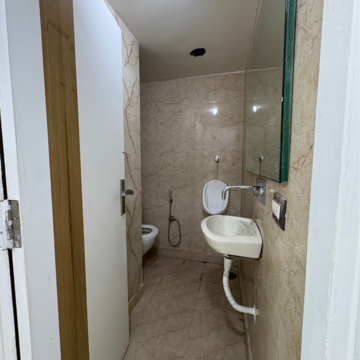 Bathroom in  Office Space at Netaji Subhash Place – for Rent
