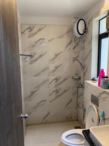 Bathroom in 3 BHK Apartment at Dosti West County Phase 2 Dosti Cedar, Balkum Pada – for Rent