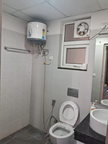 Bathroom in 3.5 BHK Builder Floor at Smart World Gems, Sector 89 – for Rent