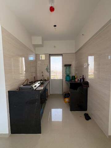 Kitchen in 1 BHK Apartment at Radheya Sai Enclave, Naigaon East – for Rent