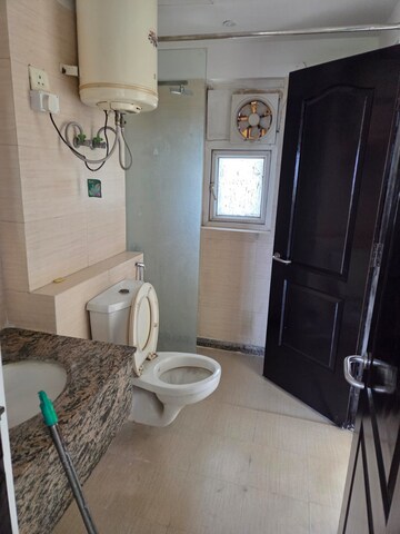 Bathroom in 3.5 BHK Apartment at Uppal Plumeria Garden Estate, Omicron Iii Greater Noida – for Sale