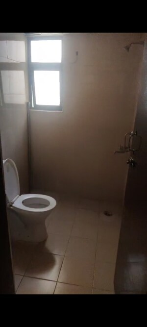 Bathroom in 1 BHK Apartment at Devika Skypers, Raj Nagar Extension – for Sale