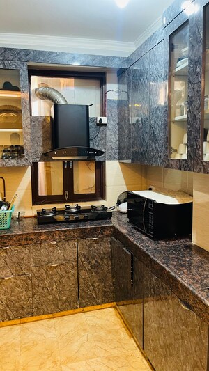 Kitchen in 2 BHK Apartment at Ajnara Integrity, Raj Nagar Extension – for Sale