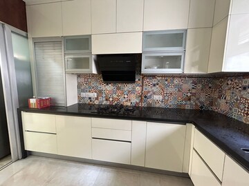 Kitchen in 3 BHK Apartment at Rodas Enclave Evergreen, Patlipada – for Rent