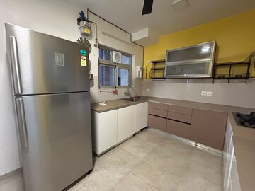 Kitchen in 4 BHK Apartment at Rodas Enclave Evergreen, Patlipada – for Rent