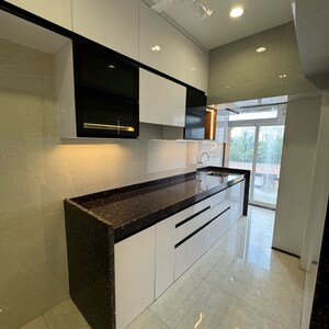 Kitchen in 1 BHK Apartment at Satyam Paradise, Ulwe Sector 18 – for Sale