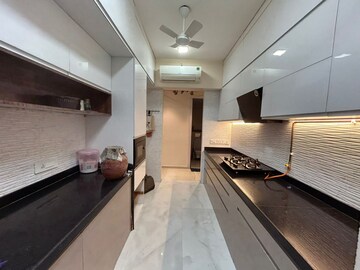 Kitchen in 4 BHK Apartment at Courtyard by Narang Realty and The Wadhwa Group, Pokhran Road No Two – for Rent