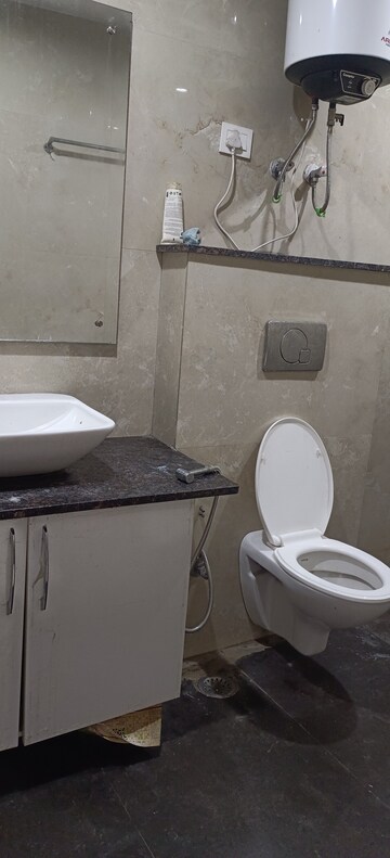 Bathroom in 3 BHK Builder Floor at Freedom Fighters Enclave – for Rent