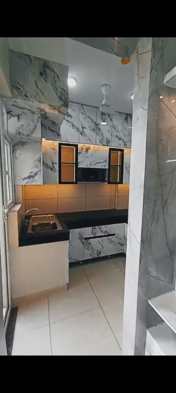 Kitchen in 2 BHK Apartment at Tata Eureka Park, Sector 150 – for Rent