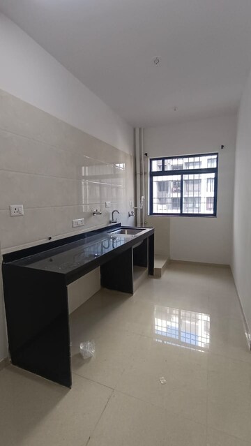 Kitchen in 1.5 BHK Apartment at Rama Metro Life Optima, Tathawade – for Rent
