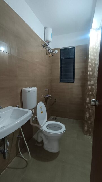 Bathroom in 1.5 BHK Apartment at Rama Metro Life Optima, Tathawade – for Rent