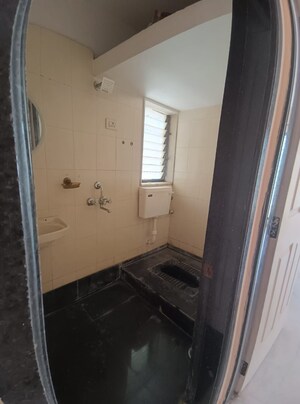 Bathroom in 2 BHK Apartment at Progressive Group Ambar, Kopar Khairane – for Sale